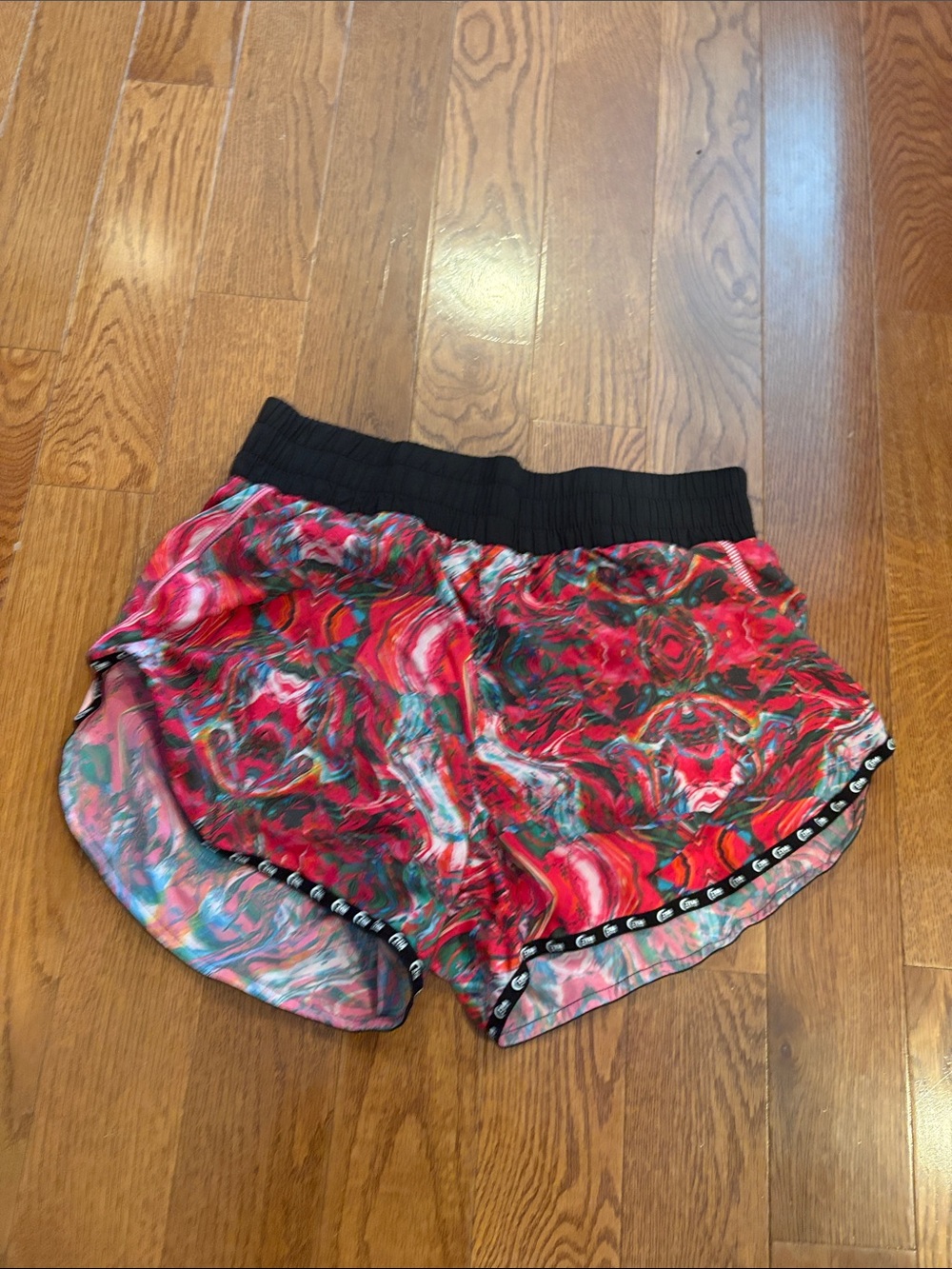 ZYIA Women's Red Floral Swirl Athletic Shorts with Black Waistband